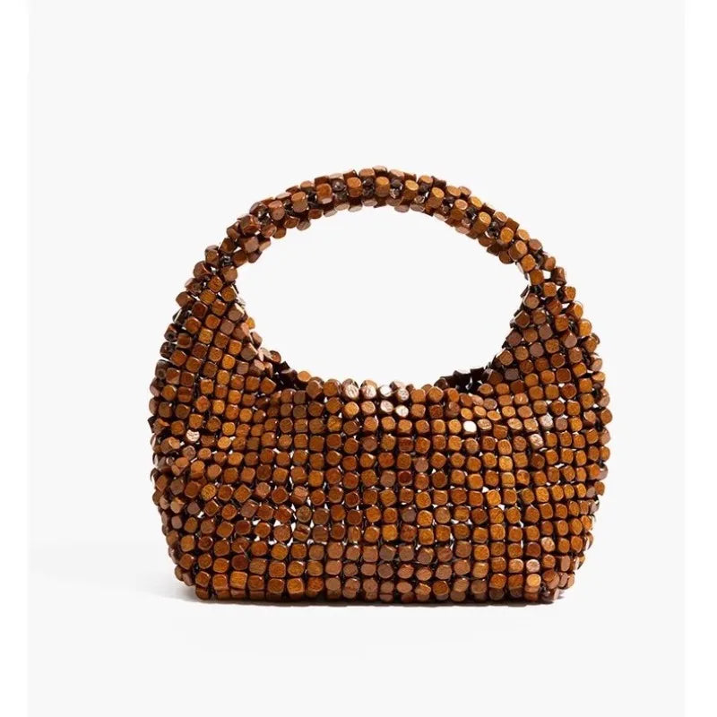 Vintage niche wooden beaded handbag 2026 new handwoven shoulder messenger bag summer beach bag